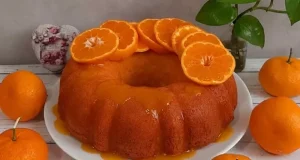 طرز تهیه کیک نارنگی خوشمزه با سس مخصوص برای یک عصرانه پاییزی زیبا